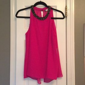 Jennifer Lopez pink blouse with neck embellishment